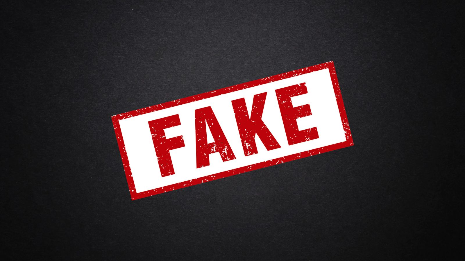 Imagem em fundo preto e com a palavra fake escrita em vermelho dentro de um retângulo branco e borda vermelha levemente inclinado sobre o card